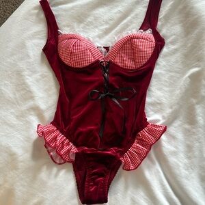 Sexy little red ridging hood two piece costume. Body suit and cape with hood.